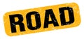 ROAD text on yellow-black grungy stamp sign