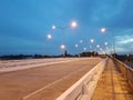 On the road in Thailand.beam light view during twilight into night Royalty Free Stock Photo