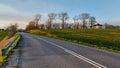 Road throught Danish agricultural field