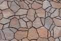 Road tiles laid out in the form of dry cracked earth Royalty Free Stock Photo