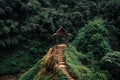 Road to the beautiful wooden Viewpoint in the fresh green forest in Indochina