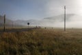 Road to Castelluccio di Norcia Umbria, Italy at dawn, with mis Royalty Free Stock Photo