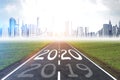 Road to city with 2020 and 2019 written on it Royalty Free Stock Photo