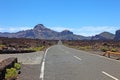 Mountains road volcanic desert highway landscape blue sky scenic El Teide volcano Tenerife Spain national park nature Canaries sun Royalty Free Stock Photo