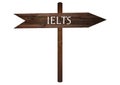 Road to IELTS text on Brown Wooden Road Sign. Royalty Free Stock Photo