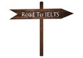 Road to IELTS text on Brown Wooden Road Sign. Royalty Free Stock Photo