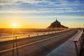 Road to Mont Saint Michel at sunset Royalty Free Stock Photo