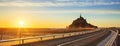 Road to Mont Saint Michel at sunset Royalty Free Stock Photo