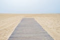 Road to nowhere wooden way sandy beach Royalty Free Stock Photo