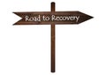 Road to recovery sign on a wooden board. Royalty Free Stock Photo