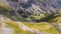 Road to the Stelvio mountain pass in Italy. Amazing aerial view of the mountain bends creating beautiful shapes