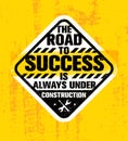 The Road To Success Is Always Under Construction. Inspiring Creative Motivation Quote. Rough Vector Typography Sign Royalty Free Stock Photo