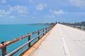 Road to tropical water paradise over a long bridge. Royalty Free Stock Photo