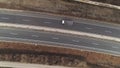 Road top down drone shot aerial truck passing