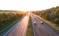 The road traffic on a motorway at sunset Royalty Free Stock Photo