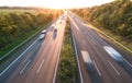 The road traffic on a motorway at sunset Royalty Free Stock Photo