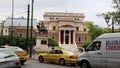 Road traffic near statue of General Theodoros Kolokotronis and old parliament house in Athens, Greece