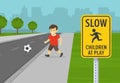 Road or traffic safety rule. Kid playing football near city road. Close up view of slow down, children at play warning sign. Royalty Free Stock Photo