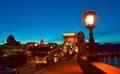 Road traffic on Szechenyi Chain Bridge Budapest city at dusk Hungary