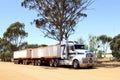 Heavy cargo trailer, Road train transport at the Lasseter Highway, Australia Royalty Free Stock Photo