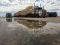 Road train trucks standing in parking lot rest area