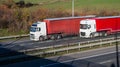 Road transport - two lorries on the motorway Royalty Free Stock Photo