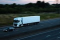 Road transport - white lorry at dusk Royalty Free Stock Photo
