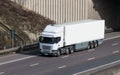 Road transport - white lorry on the motorway Royalty Free Stock Photo