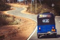 Road traveling. Tuk-tuk auto rickshaw. Bajay or Bajaj