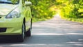 Road trip on beautiful light green car Royalty Free Stock Photo