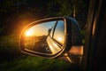 Road trip car mirror. Sun, highway car road reflection in mirror. Summer holidays trip concept. Royalty Free Stock Photo