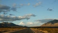 Road trip, driving auto from Death Valley to Las Vegas, Nevada USA. Hitchhiking traveling in America. Highway journey Royalty Free Stock Photo