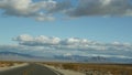Road trip, driving auto from Death Valley to Las Vegas, Nevada USA. Hitchhiking traveling in America. Highway journey Royalty Free Stock Photo