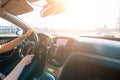 Road trip. Happy young woman have fun travel inside car at sunset. winter vacation concept with driver Royalty Free Stock Photo