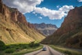 road trip past towering mountains and scenic canyons Royalty Free Stock Photo