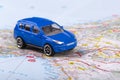Road trip, small toy car on map Royalty Free Stock Photo
