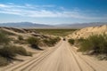 road trip to the desert, with sand dunes and rolling hills in view Royalty Free Stock Photo