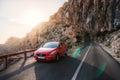 Road trip to mountain with Red car Volvo, Mallorca, Spain