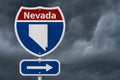 Road trip to Nevada, Red, white and blue interstate highway road sign with word Nevada and map of Nevada with stormy sky Royalty Free Stock Photo