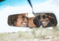 Road trip, travel and black couple happy about a holiday in a car mirror reflection together. Happiness and love smile