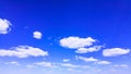 Blue sky background with tiny white clouds, panorama. Royalty Free Stock Photo