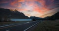 The Road trip view of travel with mountain view foggy in the morning with sunrise sky scene at fiordland Royalty Free Stock Photo