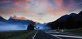 The Road trip view of travel with mountain view of autumn scene and foggy in the morning with sunrise sky scene Royalty Free Stock Photo