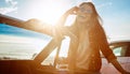 The road tripping life is the best life. a happy young woman enjoying a summers road trip. Royalty Free Stock Photo