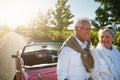 Road trips bring people closer together. a senior couple going on a road trip.