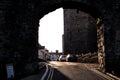 Road through a tunnel with parked cars near Castell Caernarfon, United Kingdom