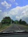 Road turning blue sky