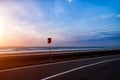 The road turns along the beach at sunset Royalty Free Stock Photo