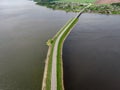 The road between two lakes. Nature bridge. Aerial view, Royalty Free Stock Photo