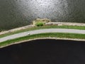 The road between two lakes. Nature bridge. Aerial view, Royalty Free Stock Photo